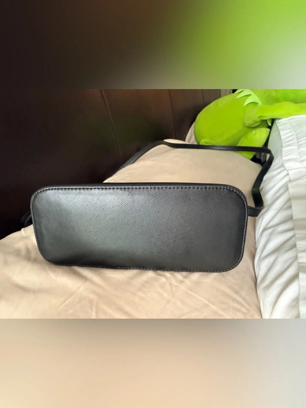 Kate Spade New York Payton Dome Crossbody in black saffiano leather.